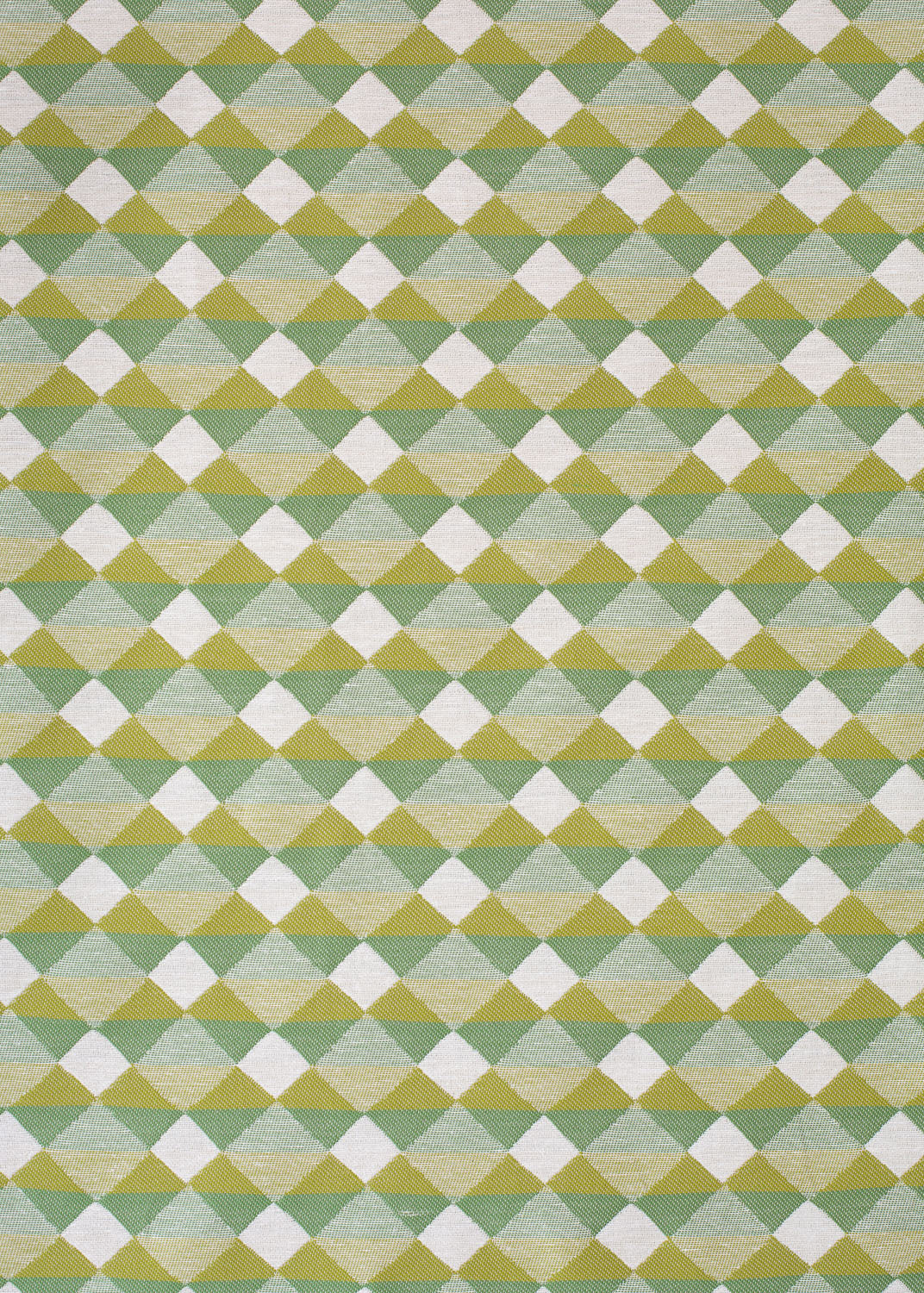 Detail of fabric in a textural diamond lattice print in cream on a green and mustard field.