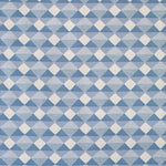 Detail of fabric in a textural diamond lattice print in cream on a blue field.