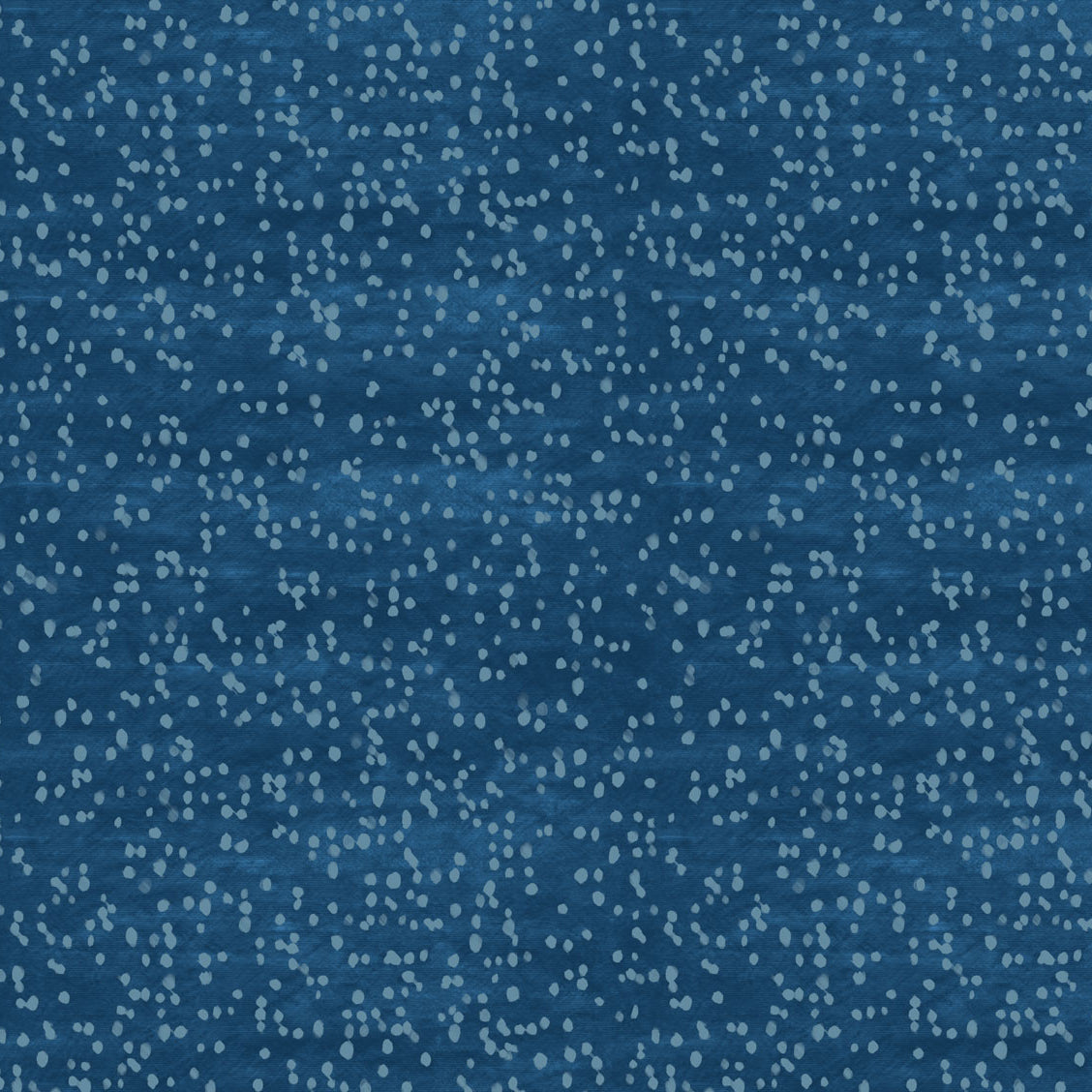 Detail of fabric in an abstract dotted pattern in blue on a mottled navy field.