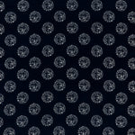 printed cotton fabric in a repeating dotted pattern in white on an indigo field.