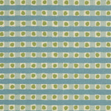 Detail of fabric in a playful dotted check print in green and blue on a cream field.