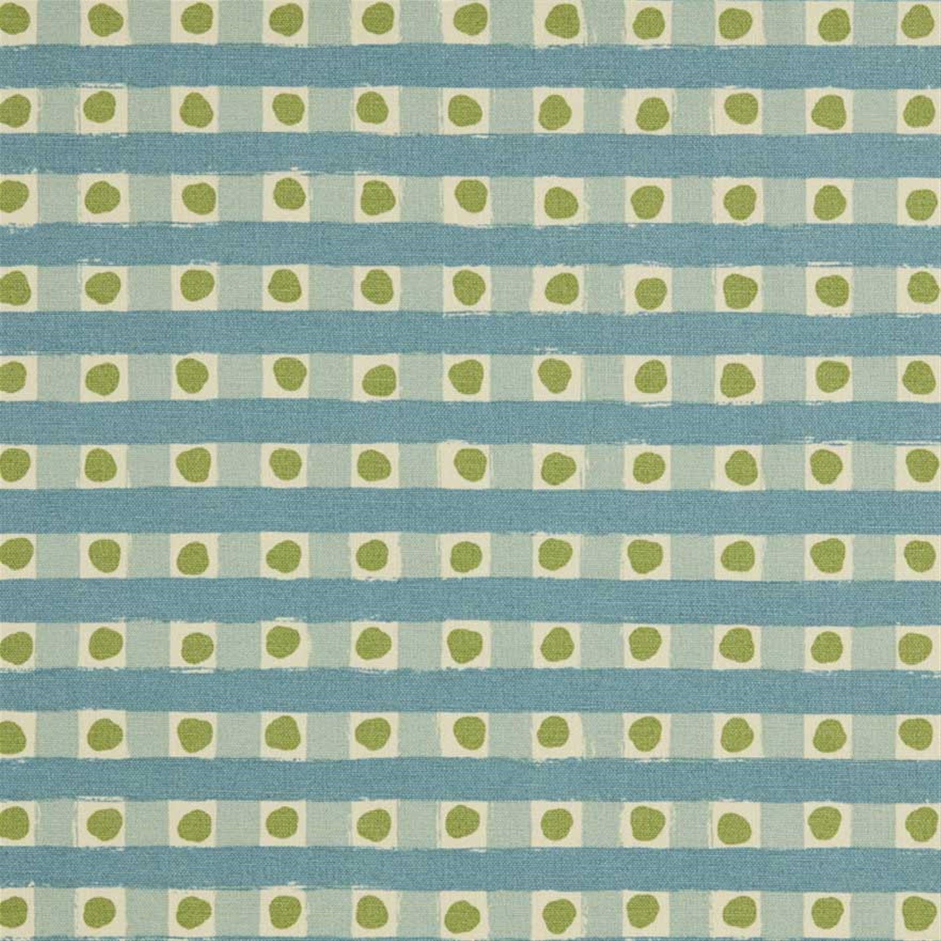 Detail of fabric in a playful dotted check print in green and blue on a cream field.