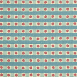 Detail of fabric in a playful dotted check print in turquoise and red on a cream field.