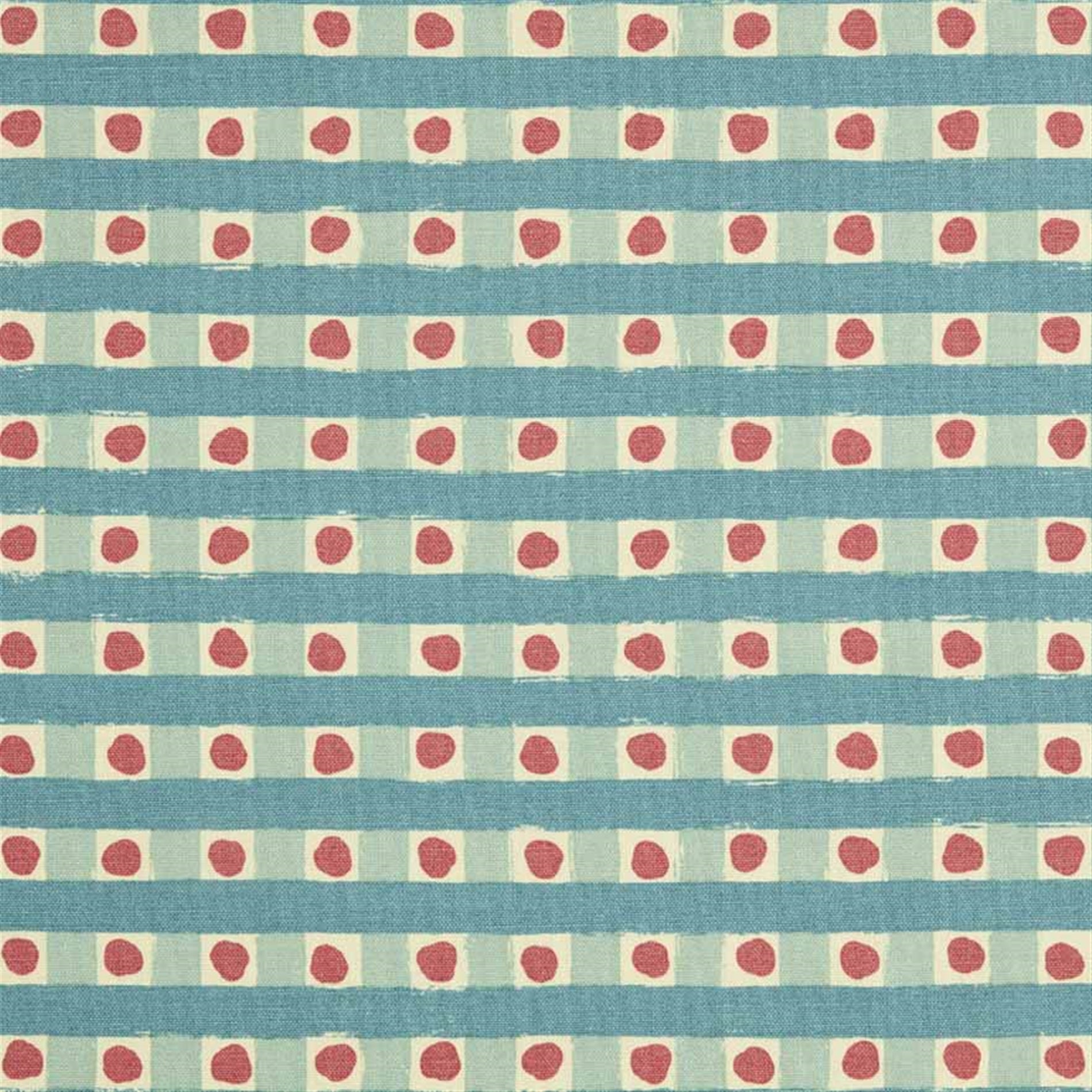 Detail of fabric in a playful dotted check print in turquoise and red on a cream field.