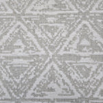 Broadloom carpet sample in a textural stacked triangle pattern in white and light grey