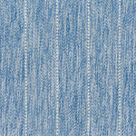 Broadloom carpet in a herringbone stripe pattern in heather blue.