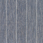 Broadloom carpet in a herringbone stripe pattern in slate blue.