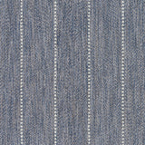 Broadloom carpet in a herringbone stripe pattern in slate blue.