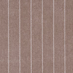 Broadloom carpet in a herringbone stripe pattern in brown.