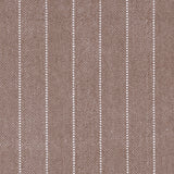 Broadloom carpet in a herringbone stripe pattern in brown.