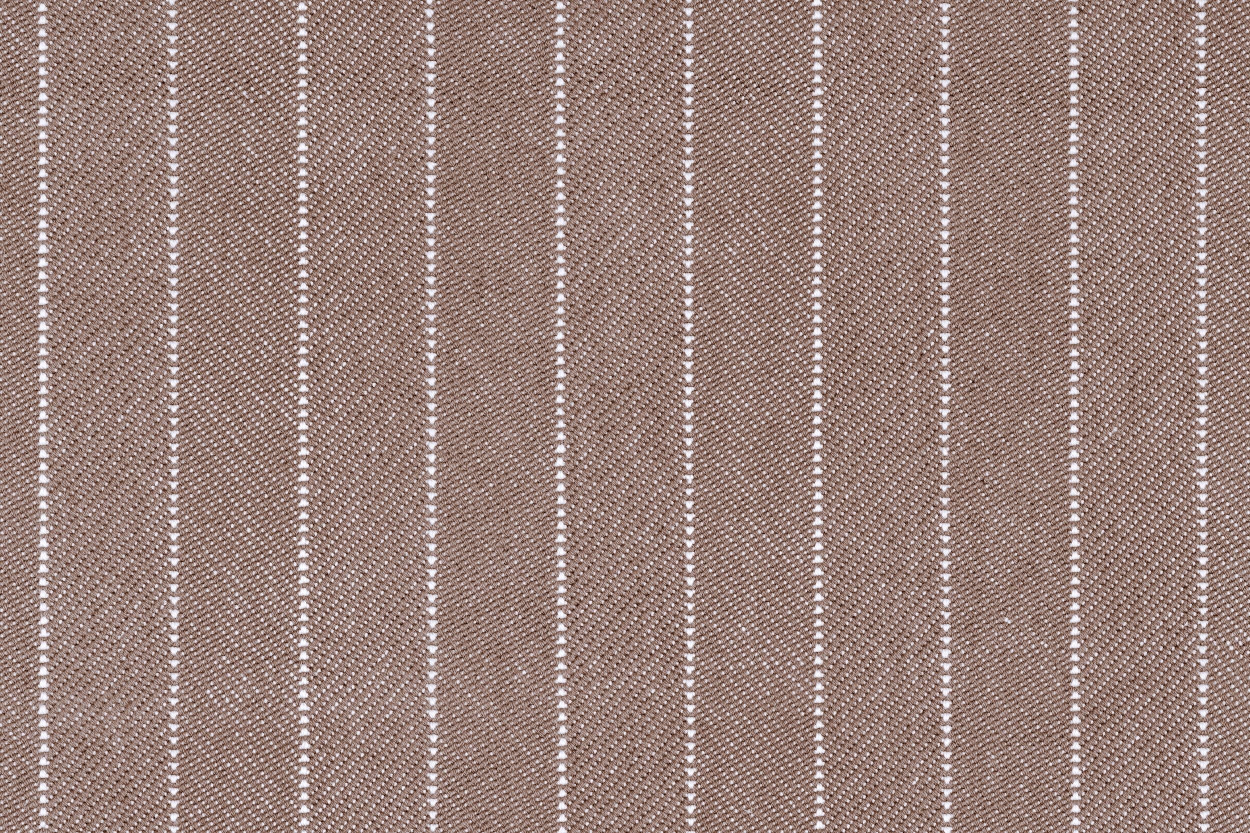 Broadloom carpet in a herringbone stripe pattern in brown.
