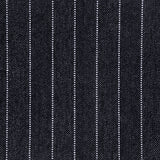 Broadloom carpet in a herringbone stripe pattern in black and white. 