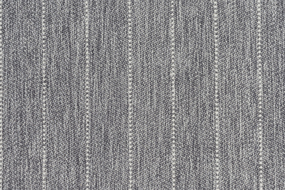 Broadloom carpet in a herringbone stripe pattern in heather grey