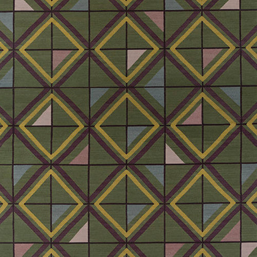 Geometric patterned rug with green, yellow, and purple colors.