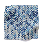 Square fabric swatch in a thatched herringbone pattern in shades of blue and navy.