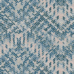 Detail of fabric in a thatched herringbone pattern in shades of pink, blue and navy.