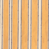 Fabric in a repeating striped pattern in mustard and navy on a cream field.