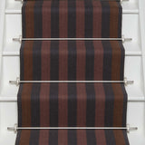 Striped flatweave runner in red ran and black on white staircase