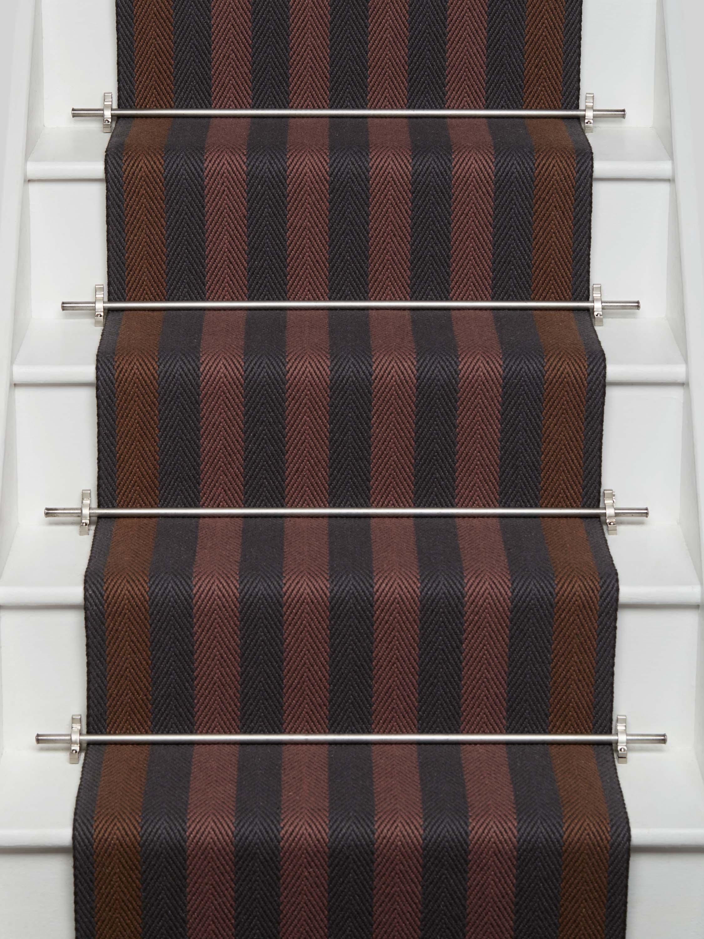 Striped flatweave runner in red ran and black on white staircase