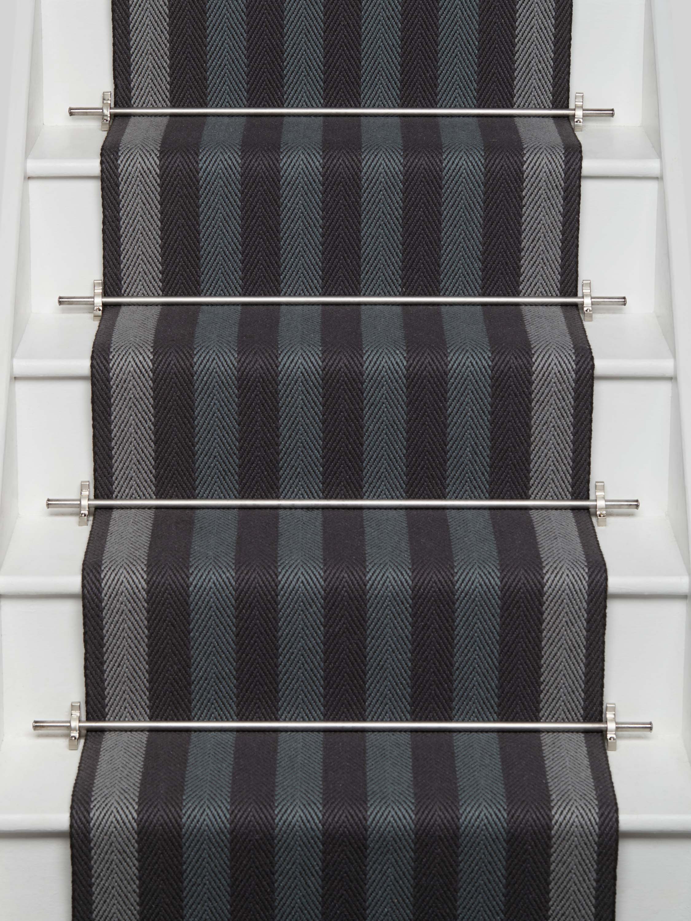 Striped flatweave runner in grey blue and black on white staircase