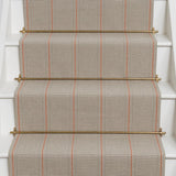 Striped flatweave runner in grey and red on white staircase