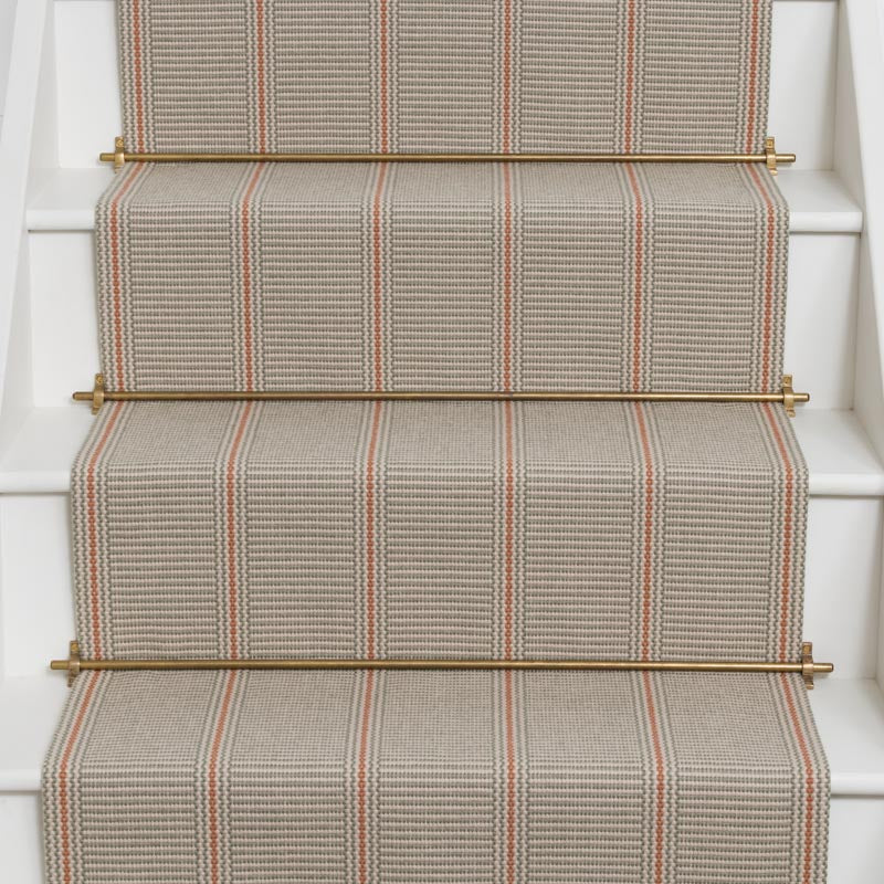 Striped flatweave runner in grey and red on white staircase