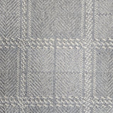 Broadloom carpet in wide box checkerboard pattern in cream and light blue.