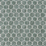 Detail of a printed linen fabric in a repeating knotted pattern in jade on a white field.