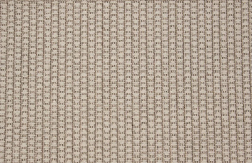 Broadloom carpet swatch in a textured pattern light grey tan color