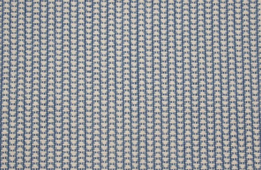 Broadloom carpet swatch in a textured pattern blue color