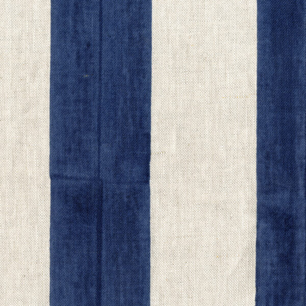 Fabric in a wide stripe pattern in navy and cream.