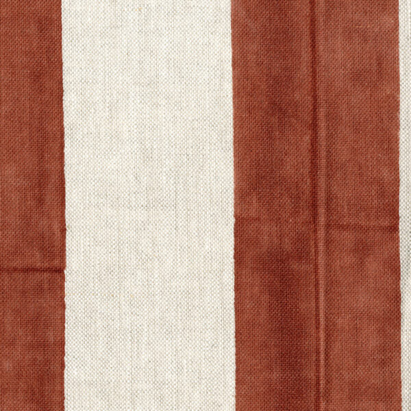 Fabric in a wide stripe pattern in rust and cream.