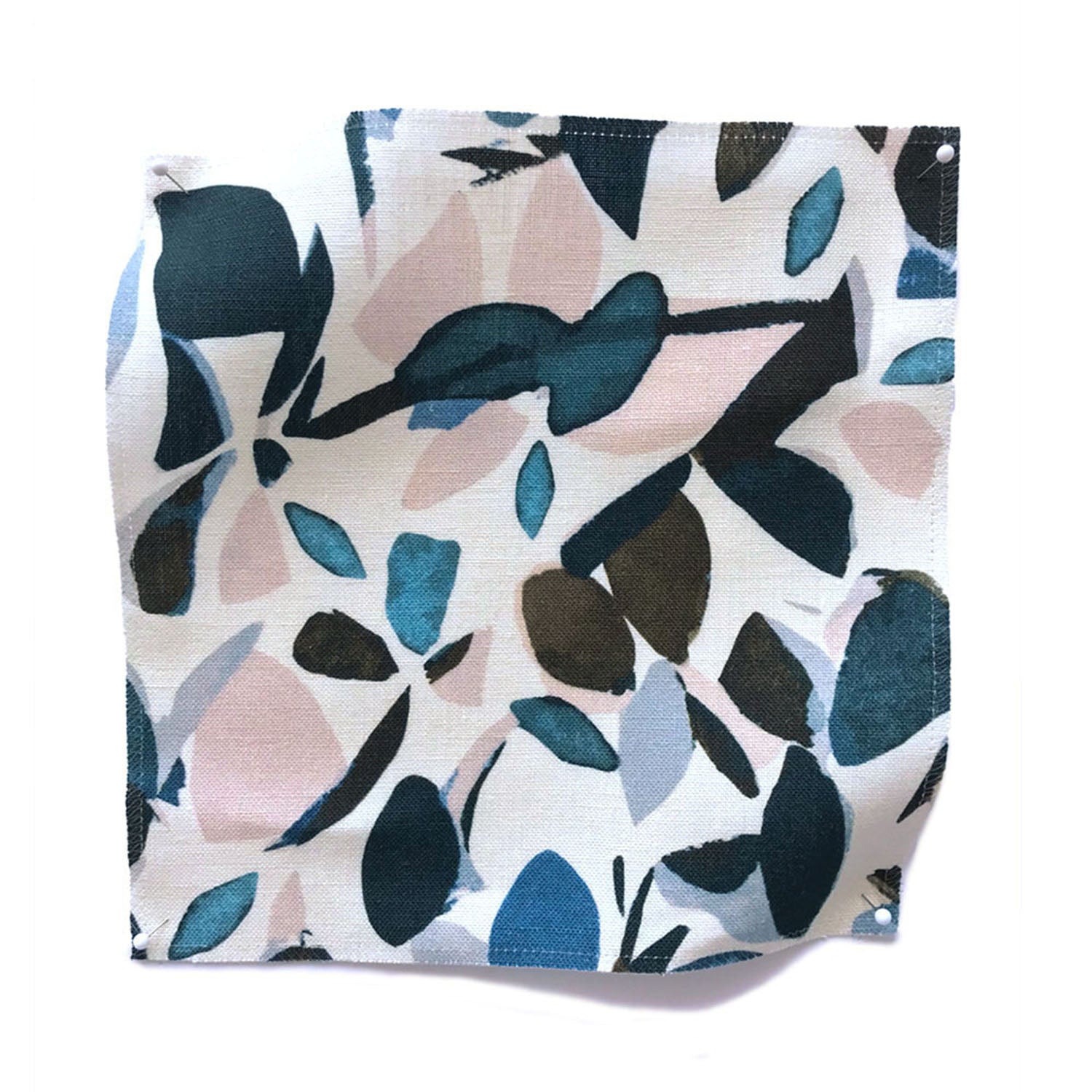 Square fabric swatch in a minimal leaf print in shades of blue, brown and pink on a white field.