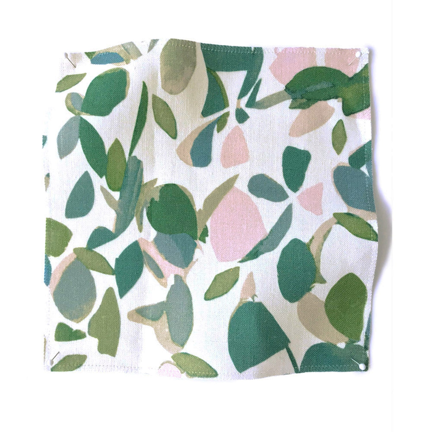 Square fabric swatch in a minimal leaf print in shades of blue, green and pink on a white field.