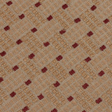 Detail of an embroidered fabric in a dashed basketweave design in tan with red accents.