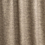 Draped fabric yardage in a textural geometric print in shades of brown on a brown field.