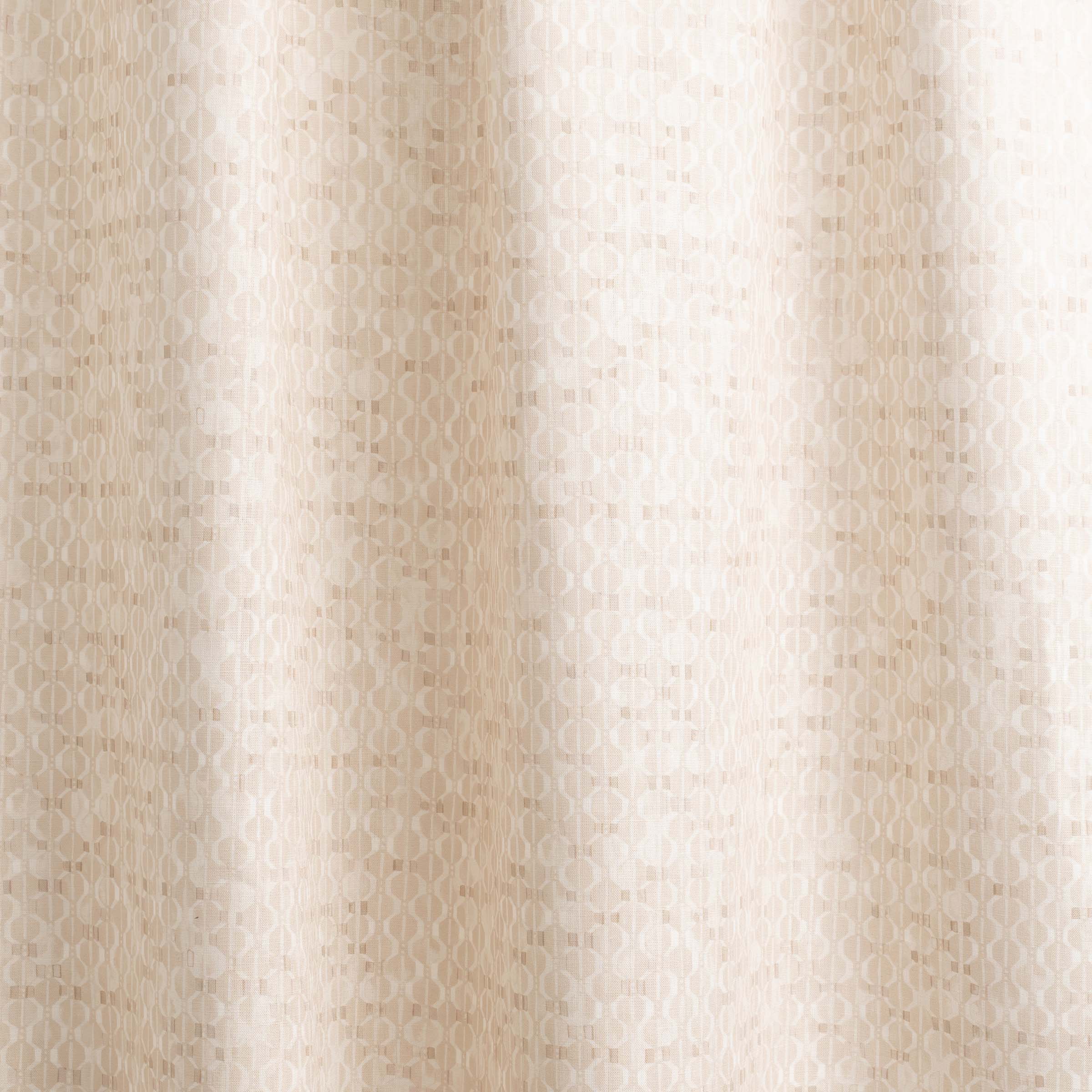 Draped fabric yardage in a textural geometric print in shades of cream on a white field.