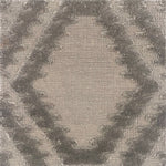 Handknotted rug with raised geometric pattern in grey. 