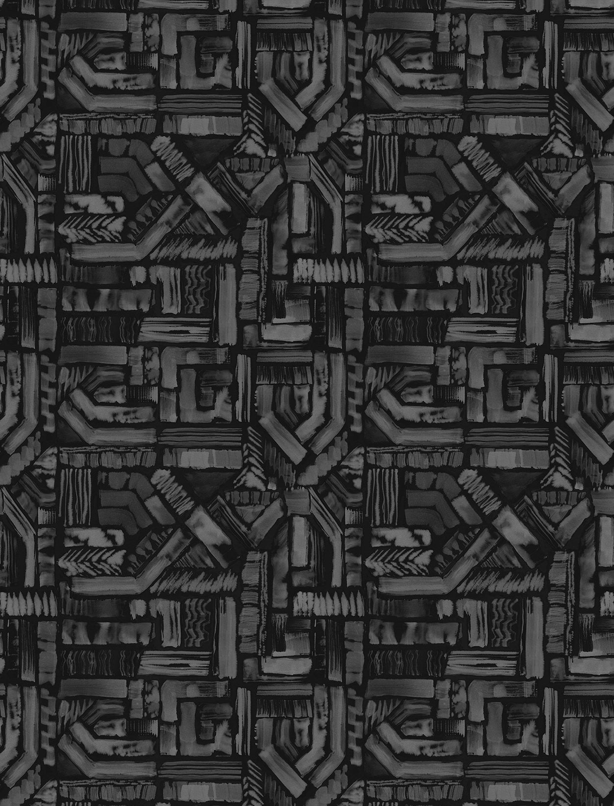 Detail of fabric in an absract geometric pattern in shades of charcoal and gray.