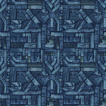 Detail of fabric in an absract geometric pattern in shades of blue and navy.