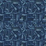 Detail of fabric in an absract geometric pattern in shades of blue and navy.