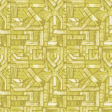 Detail of fabric in an absract geometric pattern in shades of yellow.