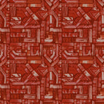 Detail of fabric in an absract geometric pattern in shades of red.