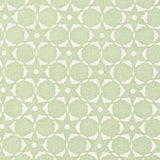 Fabric in a floral lattice print in white on a light green field.