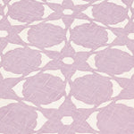 Fabric yardage in a floral lattice print in cream on a light purple field.