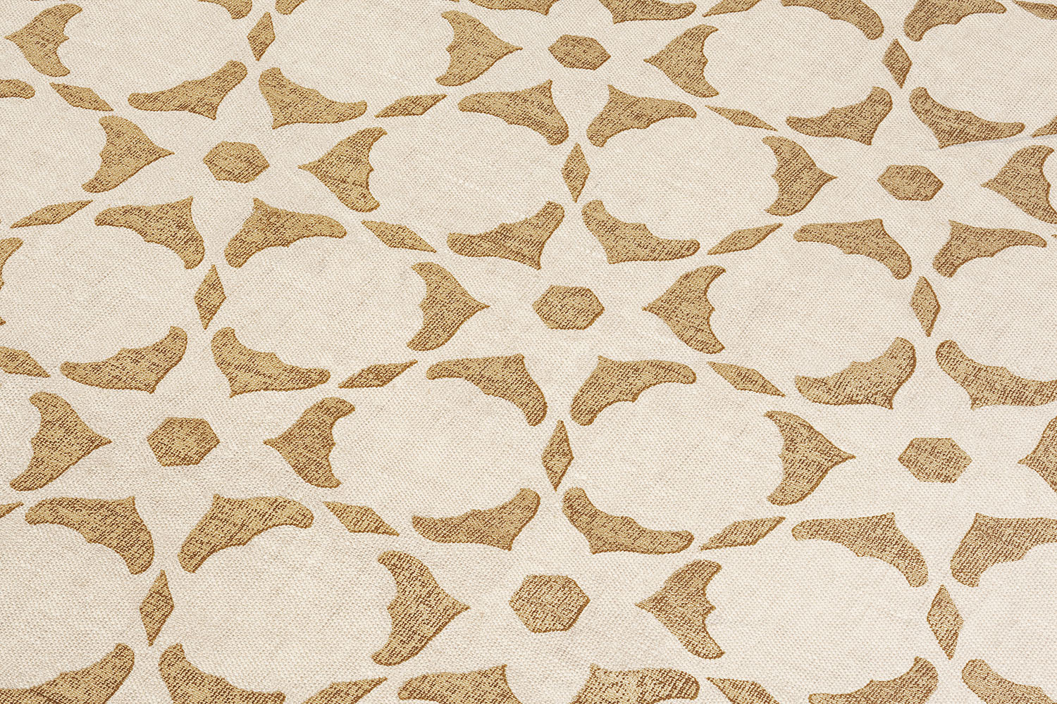 Fabric yardage in a floral lattice print in bronze on a cream field.