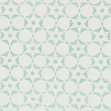 Fabric in a floral lattice print in turquoise on a white field.