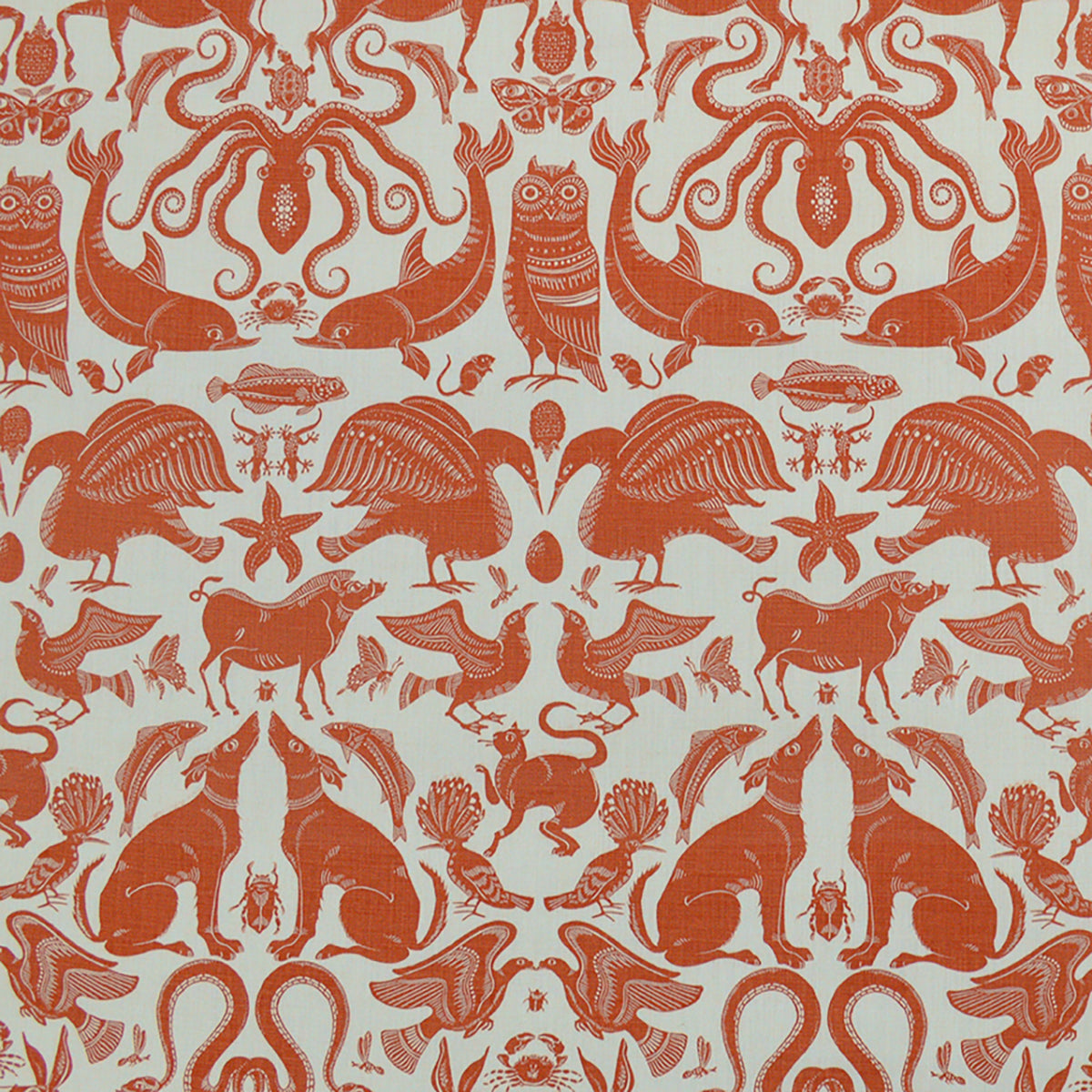 Patterned fabric with animals and sea creatures in orange on a white background