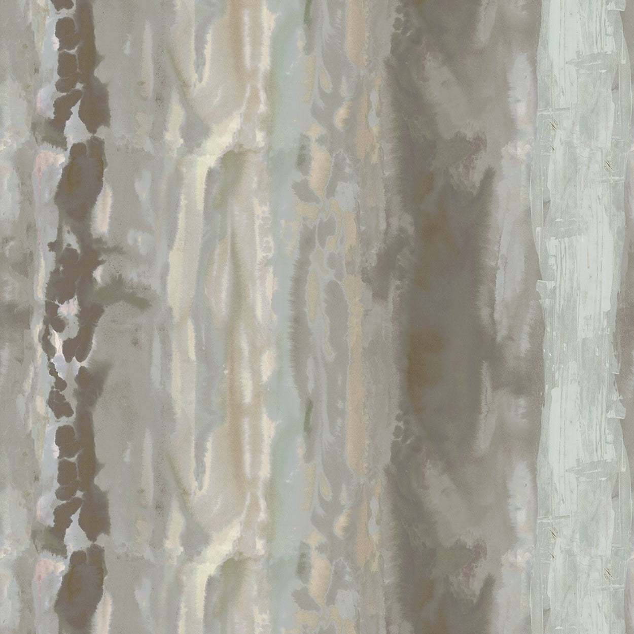 Detail of fabric in an abstract paint swatch print in shades of brown, gray and blue.