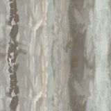 Detail of fabric in an abstract paint swatch print in shades of brown, gray and blue.